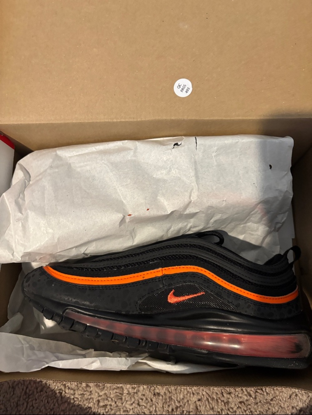 Nike Black Sneakers with Orange Swoosh and Trim
